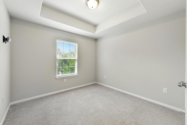 7202 Redding Dr Unit 203, Austin, TX 78745 - carpeted empty room with baseboards and a tray ceiling