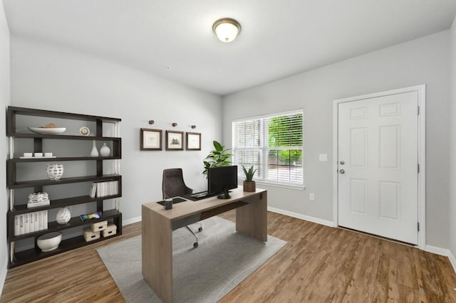 7202 Redding Dr Unit 203, Austin, TX 78745 - home office with wood finished floors and baseboards
