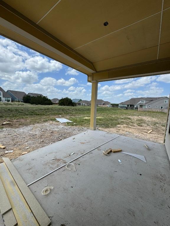 566 Sage Thrasher Cir, Dripping Springs, TX 78620 - view of patio with a residential view