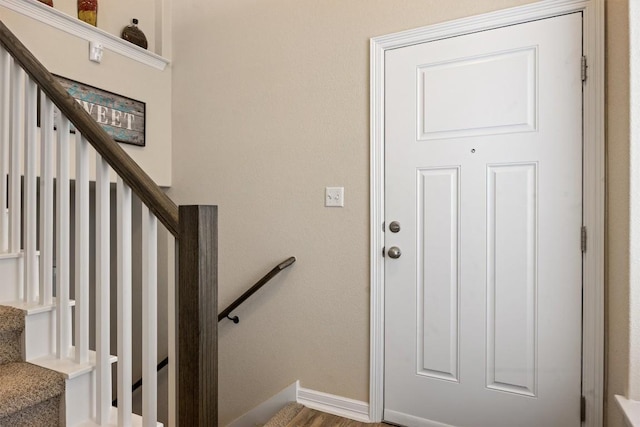 2302 Dillon Pond Ln Unit A, Pflugerville, TX 78660 - stairway featuring baseboards and wood finished floors
