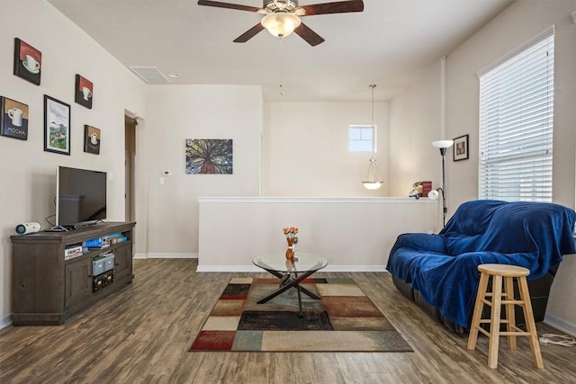 2302 Dillon Pond Ln Unit A, Pflugerville, TX 78660 - living area featuring wood finished floors and a ceiling fan