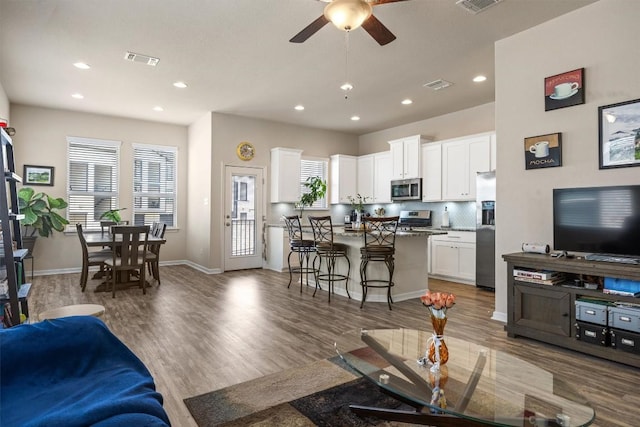 2302 Dillon Pond Ln Unit A, Pflugerville, TX 78660 - living room featuring recessed lighting, a ceiling fan, and wood finished floors