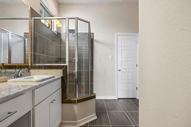 2302 Dillon Pond Ln Unit A, Pflugerville, TX 78660 - bathroom with vanity, tiled shower, and tile patterned flooring
