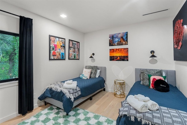 4808 Ranch Rd Unit 2222, Austin, TX 78731 - bedroom featuring wood finished floors and baseboards