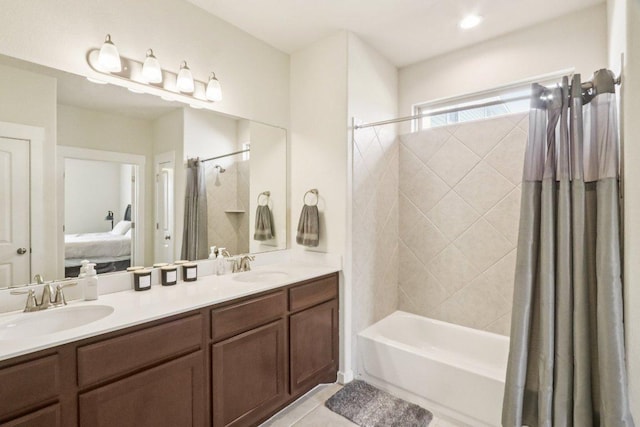 140 Syrah Ct, Leander, TX 78641 - bathroom featuring ensuite bathroom, shower / bath combination with curtain, double vanity, and tile patterned floors
