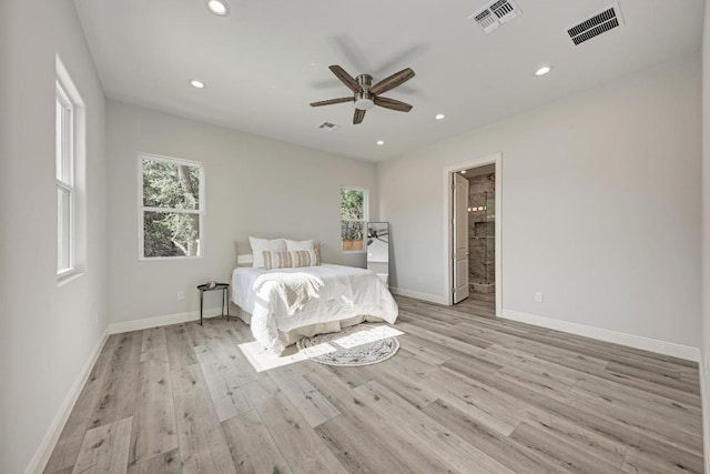 13201 Mansfield Dr, Austin, TX 78732 - bedroom featuring recessed lighting, light wood-style flooring, ensuite bath, and ceiling fan