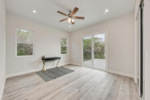 13201 Mansfield Dr, Austin, TX 78732 - spare room featuring plenty of natural light, light wood-type flooring, ceiling fan, and recessed lighting