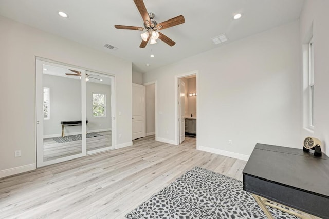 13201 Mansfield Dr, Austin, TX 78732 - unfurnished office with ceiling fan, light wood-type flooring, and recessed lighting