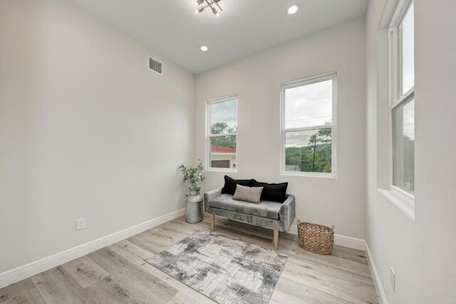 13201 Mansfield Dr, Austin, TX 78732 - living area with wood finished floors and recessed lighting