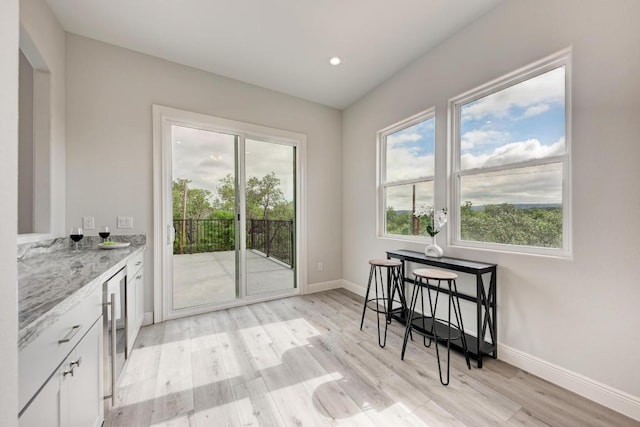 13201 Mansfield Dr, Austin, TX 78732 - dining area with light wood-style flooring and recessed lighting