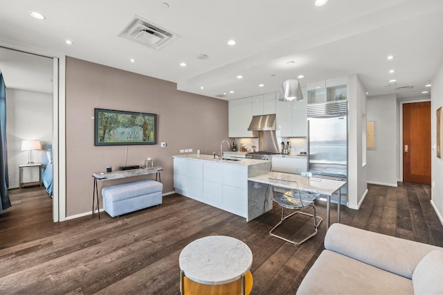 200 Congress Ave Unit 33Bb, Austin, TX 78701 - living area featuring dark wood-style floors and recessed lighting