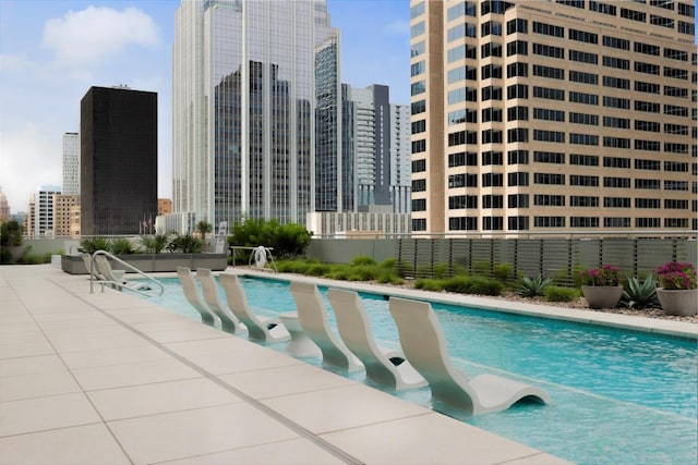 200 Congress Ave Unit 33Bb, Austin, TX 78701 - community pool featuring a view of skyline