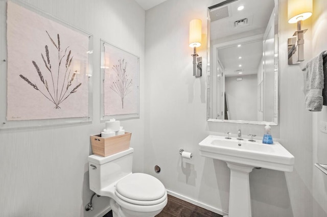 200 Congress Ave Unit 33Bb, Austin, TX 78701 - half bath featuring toilet and wood finished floors