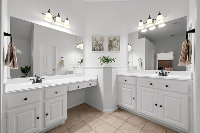 2308 Windswept Dr, Austin, TX 78738 - full bath featuring two vanities and tile patterned flooring
