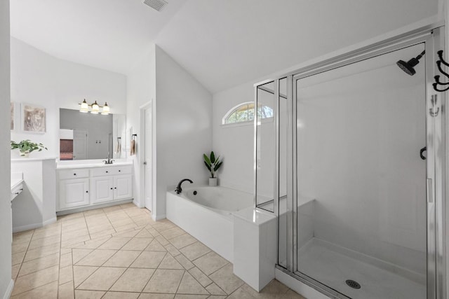 2308 Windswept Dr, Austin, TX 78738 - bathroom featuring vanity, a bath, a stall shower, tile patterned flooring, and lofted ceiling