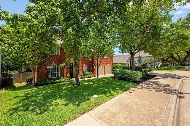 2308 Windswept Dr, Austin, TX 78738 - view of front facade featuring brick siding and concrete driveway