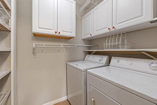 100 Lido Cir Unit B-1, Lakeway, TX 78734 - washroom featuring separate washer and dryer and cabinet space