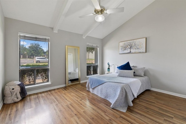 100 Lido Cir Unit B-1, Lakeway, TX 78734 - bedroom with wood finished floors and a ceiling fan