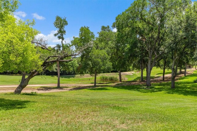 100 Lido Cir Unit B-1, Lakeway, TX 78734 - view of property's community featuring a yard