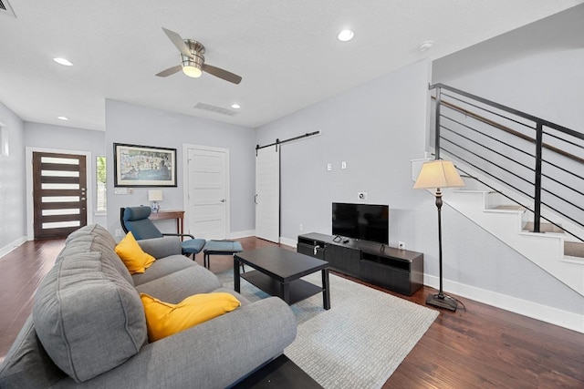 312 Delmar Ave Unit B, Austin, TX 78752 - living area with a barn door, ceiling fan, wood finished floors, recessed lighting, and stairway