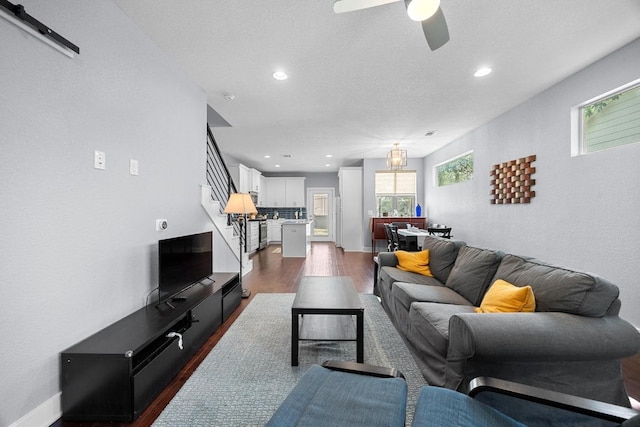 312 Delmar Ave Unit B, Austin, TX 78752 - living area featuring dark wood finished floors, a ceiling fan, recessed lighting, and stairway