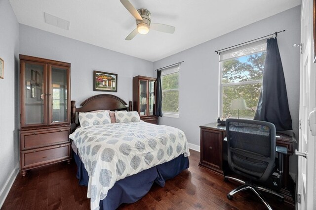 312 Delmar Ave Unit B, Austin, TX 78752 - bedroom featuring dark wood finished floors, an office area, and ceiling fan