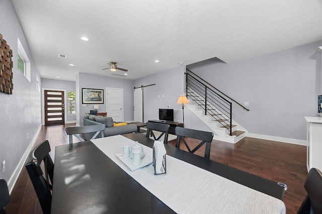 312 Delmar Ave Unit B, Austin, TX 78752 - dining area with a barn door, a ceiling fan, stairs, wood finished floors, and recessed lighting