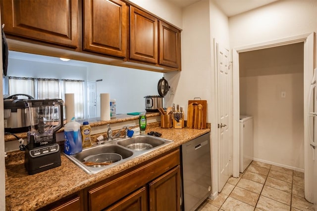807 W 25th St Unit 102, Austin, TX 78705 - kitchen with dishwasher, light tile patterned flooring, brown cabinets, and light countertops