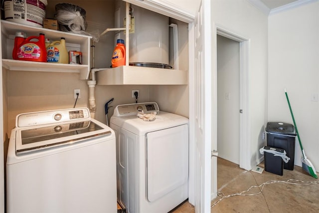 910 W 25th St Unit 403, Austin, TX 78705 - washroom featuring washer and clothes dryer, ornamental molding, and water heater