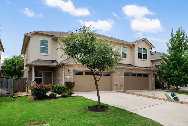 1116 La Conterra Blvd, Georgetown, TX 78626 - traditional-style house featuring an attached garage, driveway, stucco siding, and brick siding