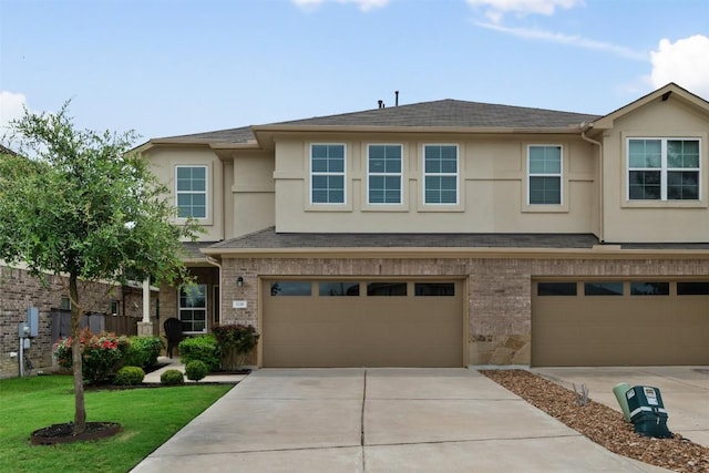1116 La Conterra Blvd, Georgetown, TX 78626 - multi unit property with concrete driveway, stucco siding, a garage, and brick siding