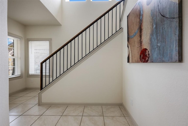 1116 La Conterra Blvd, Georgetown, TX 78626 - staircase with tile patterned flooring and baseboards