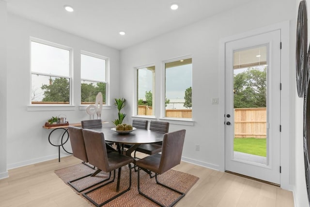 2705 Sage Ranch Dr Unit 19, Leander, TX 78641 - dining area with healthy amount of natural light, light wood finished floors, and recessed lighting