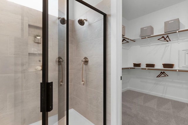 2705 Sage Ranch Dr Unit 19, Leander, TX 78641 - bathroom with a walk in closet and a shower stall