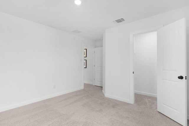 2705 Sage Ranch Dr Unit 19, Leander, TX 78641 - unfurnished bedroom with light colored carpet, a spacious closet, and recessed lighting