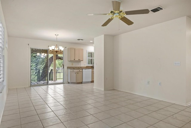 120 Plover Pass, Georgetown, TX 78633 - unfurnished living room featuring a chandelier, light tile patterned floors, and ceiling fan