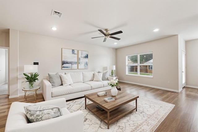 2533 Buffalo Ford Ct, Georgetown, TX 78628 - living area with light wood-style flooring, a ceiling fan, and recessed lighting