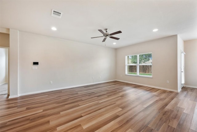 2533 Buffalo Ford Ct, Georgetown, TX 78628 - empty room with ceiling fan, light wood-style flooring, and recessed lighting
