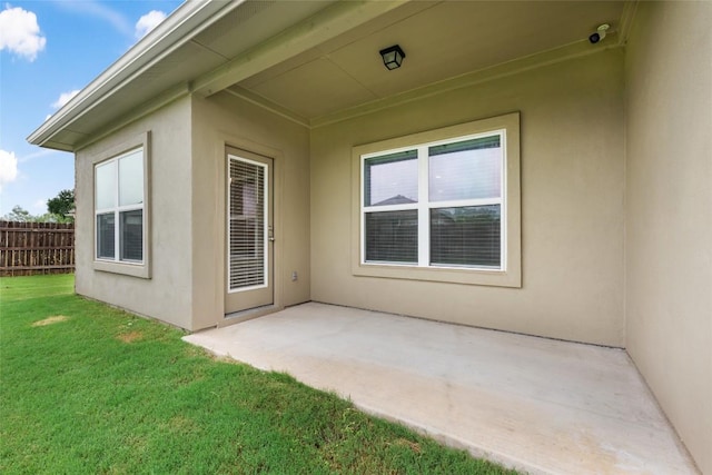 2533 Buffalo Ford Ct, Georgetown, TX 78628 - property entrance with a patio, stucco siding, and a surveillance system