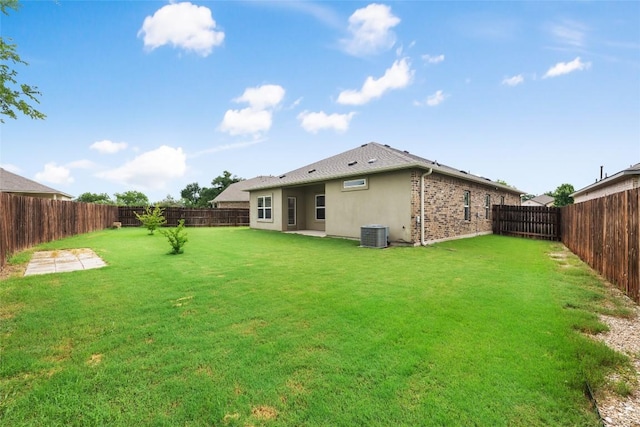 2533 Buffalo Ford Ct, Georgetown, TX 78628 - rear view of house featuring a fenced backyard, stucco siding, and a patio