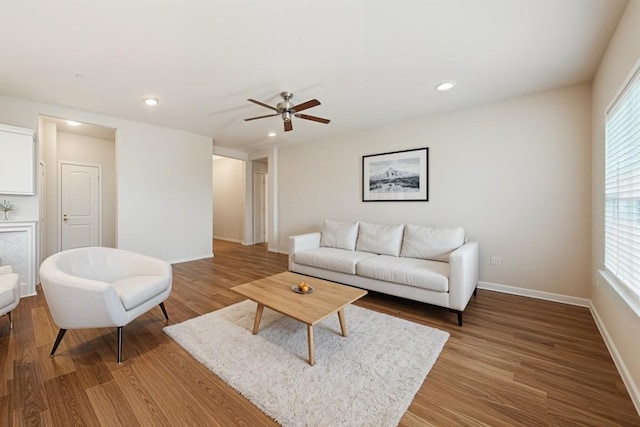 2533 Buffalo Ford Ct, Georgetown, TX 78628 - living area featuring wood finished floors, plenty of natural light, ceiling fan, and recessed lighting