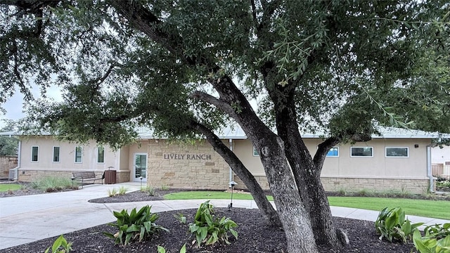 2533 Buffalo Ford Ct, Georgetown, TX 78628 - view of front of property with stucco siding and stone siding