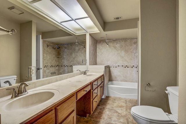 8200 Neely Dr Unit 116, Austin, TX 78759 - full bathroom featuring double vanity and a combined bath / shower with rainfall shower