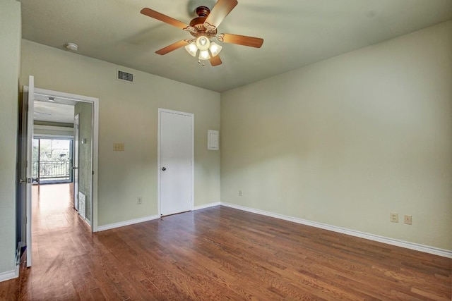 8200 Neely Dr Unit 116, Austin, TX 78759 - unfurnished bedroom featuring dark wood-style flooring and a ceiling fan
