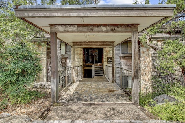 8200 Neely Dr Unit 116, Austin, TX 78759 - doorway to property featuring stone siding