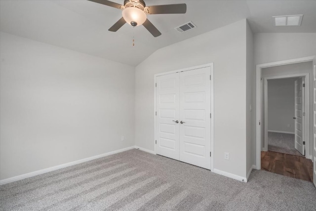 10406 Mager Ln, Hutto, TX 78634 - unfurnished bedroom featuring carpet flooring, lofted ceiling, a closet, and ceiling fan