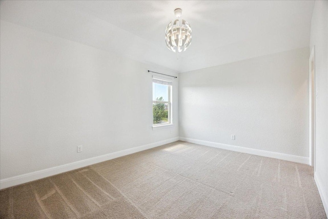 19612 Abigail Way, Pflugerville, TX 78660 - carpeted empty room featuring a chandelier and baseboards