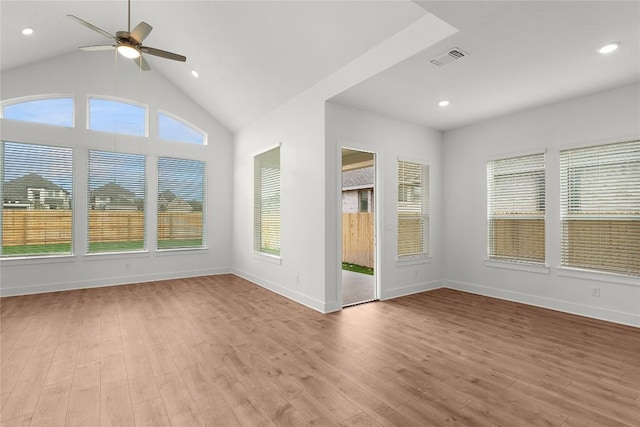 20500 Ed Townes Ter, Manor, TX 78653 - spare room featuring healthy amount of natural light, light wood finished floors, a ceiling fan, recessed lighting, and lofted ceiling