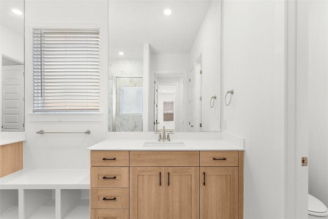 20500 Ed Townes Ter, Manor, TX 78653 - full bathroom with vanity, a stall shower, and recessed lighting