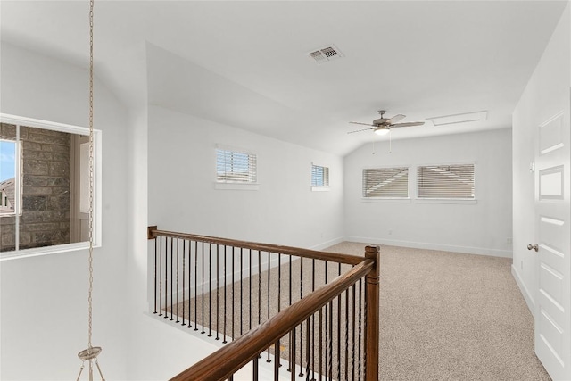 20500 Ed Townes Ter, Manor, TX 78653 - hall with carpet floors, an upstairs landing, and vaulted ceiling
